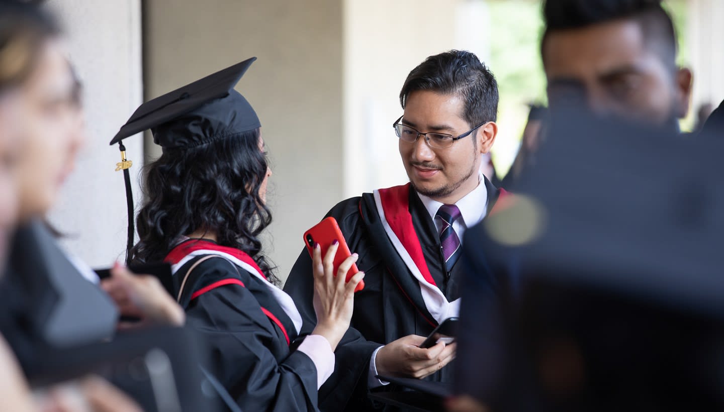 readmission - photo of students at graduation