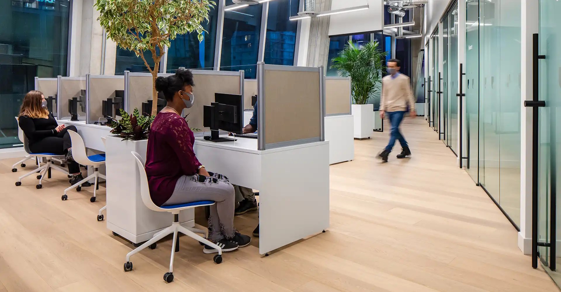 student sitting and waiting to be helped at student services centre