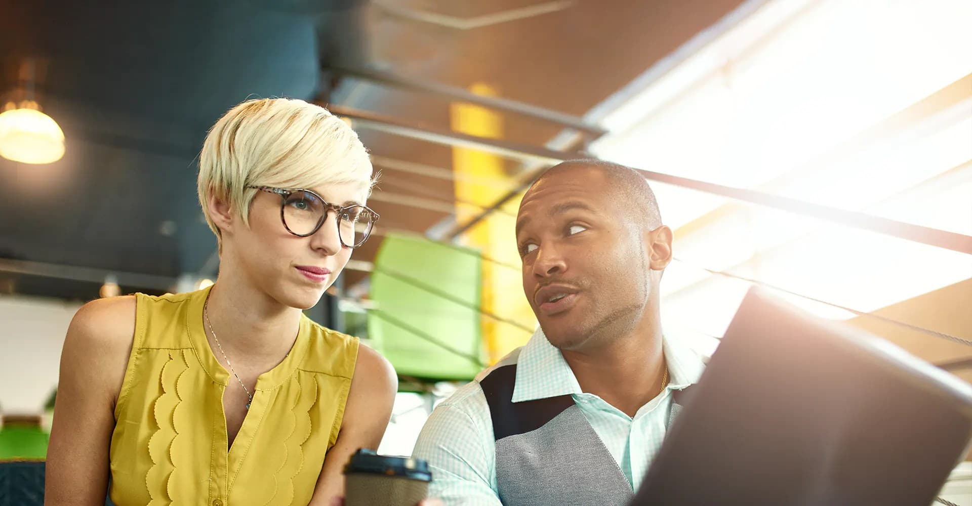 two creative business people working on social media digital strategy