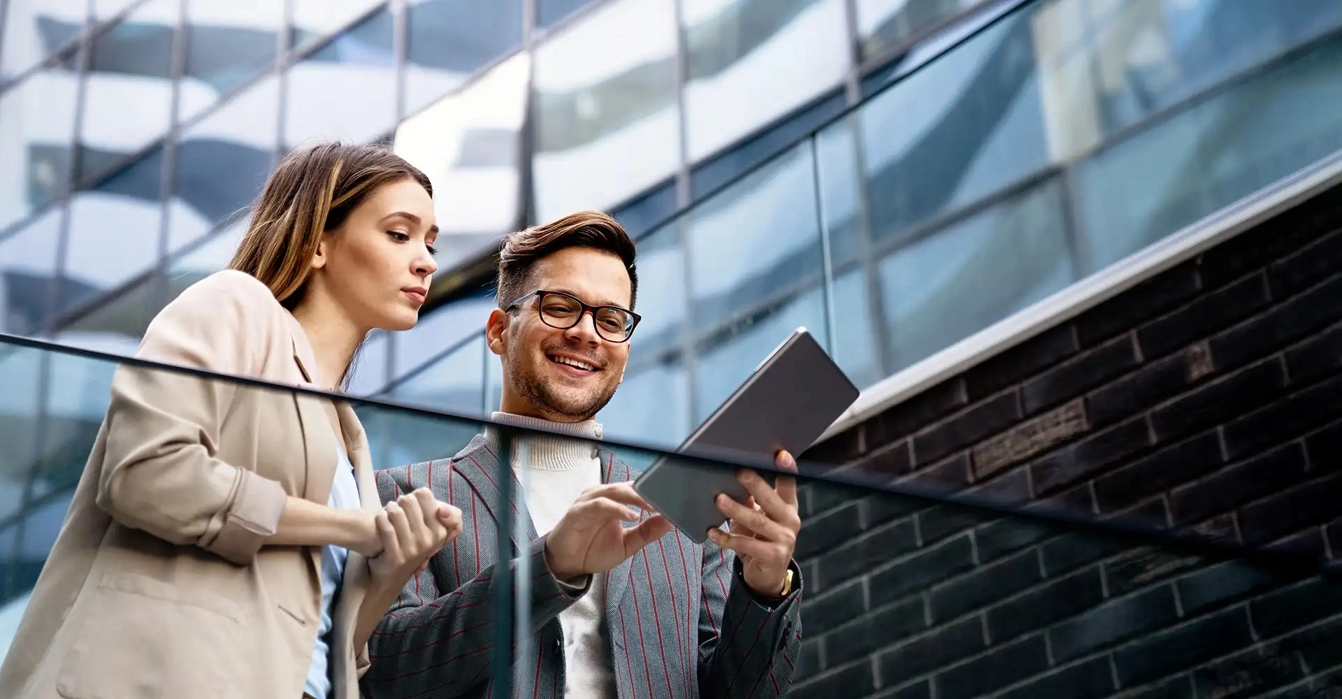 two people looking at device