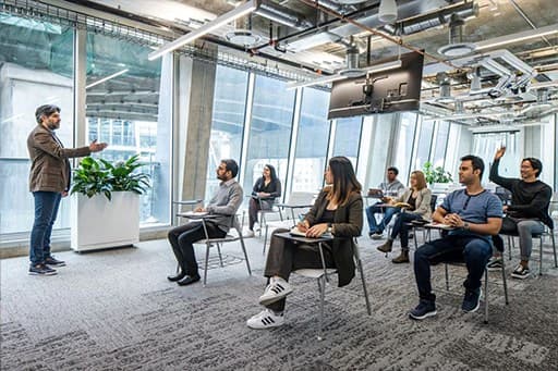 classroom of students with teacher in front at the UCW Vancouver House Campus