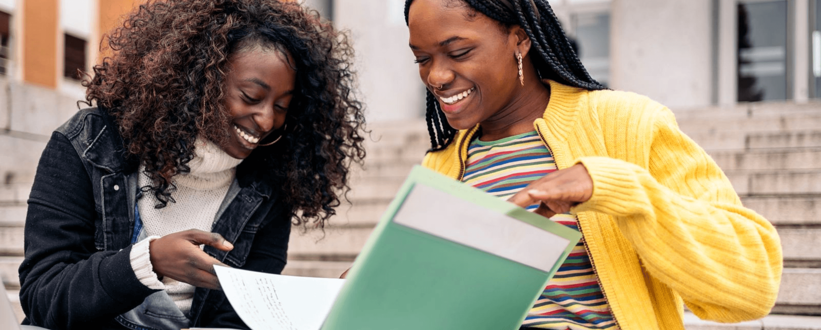 two students reviewing notes
