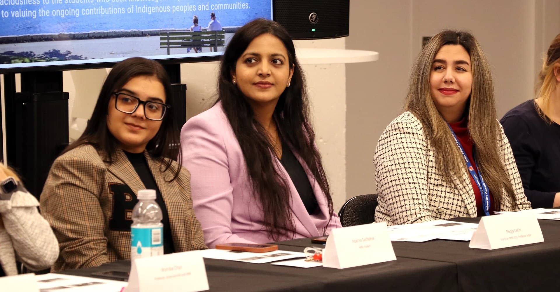 Researchers sitting at table
